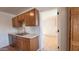 Kitchen with wood cabinets, tile floor and stainless steel appliances at 4502 W Crittenden Ln, Phoenix, AZ 85031