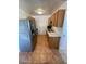 Efficient kitchen features stainless steel appliances and wood cabinets at 4502 W Crittenden Ln, Phoenix, AZ 85031