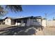 Updated single story home with a carport and newly paved driveway at 4502 W Crittenden Ln, Phoenix, AZ 85031
