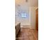 Updated bathroom with tub, tile floor and built-in storage at 4502 W Crittenden Ln, Phoenix, AZ 85031
