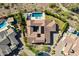 Bird's-eye view of a custom home with a unique roofline and pool at 10764 N 138Th Way, Scottsdale, AZ 85259