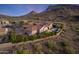 Aerial view of house, pool, and mountain view at 10764 N 138Th Way, Scottsdale, AZ 85259