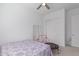 Bedroom with a bed, mini trampoline, and large closet at 22207 N Daniel Dr, Maricopa, AZ 85138