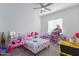 bedroom with a bed, toys, and ample storage at 22207 N Daniel Dr, Maricopa, AZ 85138