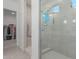 Spacious bathroom with a walk-in shower and built in shelves at 22207 N Daniel Dr, Maricopa, AZ 85138