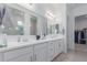 Modern bathroom with double vanity and walk-in shower at 22207 N Daniel Dr, Maricopa, AZ 85138