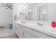 Modern bathroom with double sinks and a shower at 22207 N Daniel Dr, Maricopa, AZ 85138
