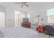 Comfortable bedroom featuring a large bed and ensuite bath at 22207 N Daniel Dr, Maricopa, AZ 85138