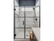 Modern shower with hexagonal marble tile and frameless glass enclosure at 5725 S 101St St, Mesa, AZ 85212