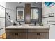 Modern bathroom boasts double vanity, hexagonal tile, and frameless shower at 5725 S 101St St, Mesa, AZ 85212