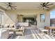 Covered patio with seating area and view into the living area at 5725 S 101St St, Mesa, AZ 85212
