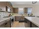 Modern kitchen with stainless steel appliances and ample counter space at 5725 S 101St St, Mesa, AZ 85212