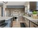 Modern kitchen with stainless steel appliances and a large island at 5725 S 101St St, Mesa, AZ 85212