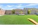 Artificial turf backyard with covered patio and play area at 5725 S 101St St, Mesa, AZ 85212