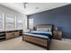 Spacious bedroom with wood-look flooring and neutral color palette at 5725 S 101St St, Mesa, AZ 85212