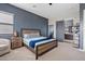 Bright bedroom with ensuite bathroom and sliding barn door at 5725 S 101St St, Mesa, AZ 85212