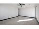 Bright bedroom with wood-look floors and a private door to outside at 31214 N 167Th Ave, Surprise, AZ 85387
