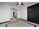 Bedroom with view of kitchen and access to bathroom at 31214 N 167Th Ave, Surprise, AZ 85387