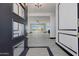 Stylish entryway with a view into the living area at 31214 N 167Th Ave, Surprise, AZ 85387