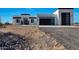 Modern home with clean lines and a two-car garage at 31214 N 167Th Ave, Surprise, AZ 85387