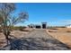 Modern desert home with a large garage and driveway at 31214 N 167Th Ave, Surprise, AZ 85387