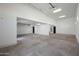 Spacious garage with high ceilings and ample storage space at 31214 N 167Th Ave, Surprise, AZ 85387