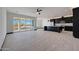 Open concept kitchen with modern dark cabinets at 31214 N 167Th Ave, Surprise, AZ 85387