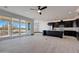Modern kitchen with island, stainless steel appliances, and white quartz countertops at 31214 N 167Th Ave, Surprise, AZ 85387
