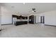 Modern kitchen with island and open floor plan at 31214 N 167Th Ave, Surprise, AZ 85387
