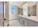 Double vanity bathroom with patterned tile floor at 31224 N 167Th Ave, Surprise, AZ 85387