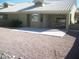 Covered patio with gravel yard and hanging swing at 5830 E Mckellips Rd # 62, Mesa, AZ 85215