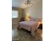 Primary bedroom with tile floors and a ceiling fan at 5830 E Mckellips Rd # 62, Mesa, AZ 85215