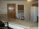 Kitchen with granite countertop island and laundry access at 5830 E Mckellips Rd # 62, Mesa, AZ 85215