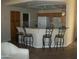 Kitchen with granite countertops and breakfast bar seating at 5830 E Mckellips Rd # 62, Mesa, AZ 85215