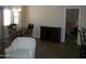Dining area with tile floors and a view into the Primary bedroom at 5830 E Mckellips Rd # 62, Mesa, AZ 85215