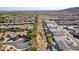 Aerial view of community with homes and a greenbelt at 28389 N 131St Dr, Peoria, AZ 85383