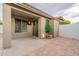 Covered patio with tile flooring and sliding glass door at 42930 N Voyage Trl, Phoenix, AZ 85086