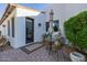 Small patio with table and chairs, near the home at 6620 E Stallion Rd, Paradise Valley, AZ 85253