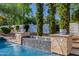 Serene waterfall feature adds tranquility to the pool area at 6620 E Stallion Rd, Paradise Valley, AZ 85253