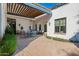 Covered patio with seating area and pergola at 6620 E Stallion Rd, Paradise Valley, AZ 85253