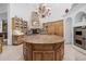 Large kitchen island with granite countertops and ample storage at 6620 E Stallion Rd, Paradise Valley, AZ 85253