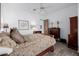 Bedroom with wood furniture and neutral color scheme at 6620 E Stallion Rd, Paradise Valley, AZ 85253
