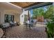 Spacious patio with seating area, fire pit, and pergola at 6620 E Stallion Rd, Paradise Valley, AZ 85253