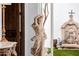 Ornate statue in entryway, with courtyard view at 6620 E Stallion Rd, Paradise Valley, AZ 85253