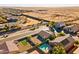 House with solar panels, pool, and backyard, aerial view at 1542 E Chaparral Pl, Casa Grande, AZ 85122