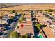 House with solar panels, located in a residential area at 1542 E Chaparral Pl, Casa Grande, AZ 85122