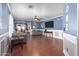 Open living room featuring tiled floors and a view into the dining area at 11836 W Roanoke Ave, Avondale, AZ 85392