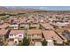 Aerial view of house and neighborhood at 21048 W Coronado Rd, Buckeye, AZ 85396