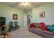 Cozy bonus room with a sofa and a TV, perfect for relaxation at 1542 E Chaparral Pl, Casa Grande, AZ 85122