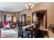 Bright dining room adjacent to the living room and staircase at 1542 E Chaparral Pl, Casa Grande, AZ 85122